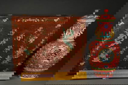 A RED-GROUND YANGCAI 'FLOWERS' REVOLVING VASE