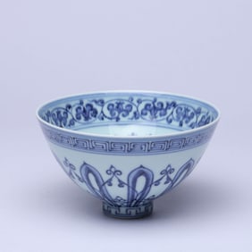A BLUE AND WHITE 'SANSKRIT AND FLOWERS' CHICKEN-HEART BOWL