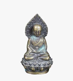 A BRONZE FIGURE OF BUDDHA