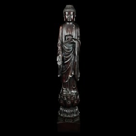 AN ALGUM WOOD FIGURE OF SAKYAMUNI BUDDHA