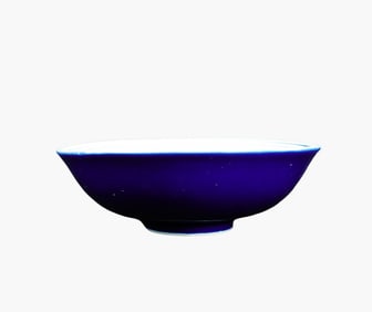 A BLUE-GROUND WUCAI 'DRAGON' BOWL