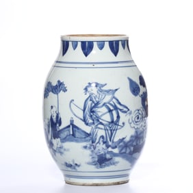 A BLUE AND WHITE 'FIGURAL' LOTUS-SEED JAR