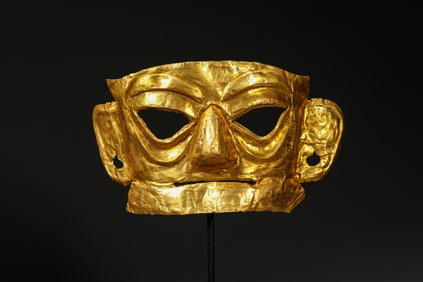 A GOLD 'SANXINGDUI-STYLE' MASK