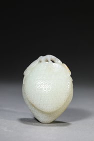 A JADE 'LITCHI' PENDANT
