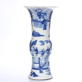 A BLUE AND WHITE 'FIGURAL' FLOWER GU