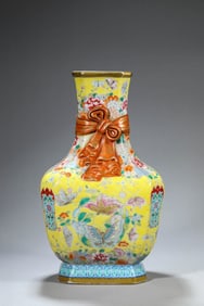 A YELLOW-GROUND FAMILLE-ROSE 'BUTTERFLIES AMONG FLOWERS' VASE