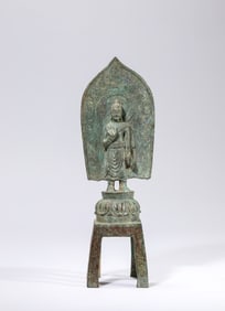 A BRONZE FIGURE OF BUDDHA