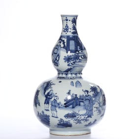 A BLUE AND WHITE 'FIGURAL' DOUBLE-GOURD VASE