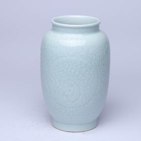 A WHITE-GLAZED 'PHOENIX AMONG FLOWERS' LANTERN-SHAPED JAR