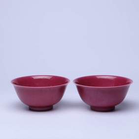 A PAIR OF RUBY RED-GLAZED BOWLS