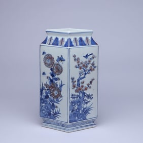 A BLUE AND WHITE AND COPPER-RED 'FLOWERS AND BIRDS'  VASE