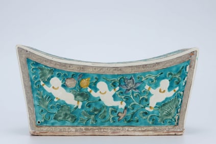 A SANCAI 'LOTUS AND CHILD' PILLOW