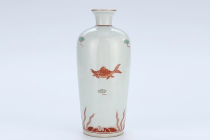 A BLUE AND WHITE AND IRON-RED 'FISH' ROULEAU VASE