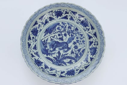 A BLUE AND WHITE 'AUSPICIOUS BEASTS' LOBED LARGE DISH