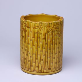 A YELLOW-GLAZED 'BAMBOO' BRUSH POT