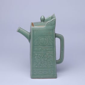 A LONGQUAN 'FLOWERS AND SHOU ' MONGOLIAN-STYLE EWER