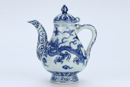 A BLUE AND WHITE 'DRAGON' PEAR-SHAPED EWER