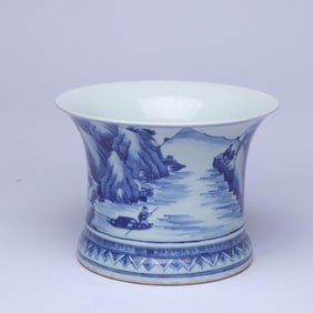 A BLUE AND WHITE 'LANDSCAPE AND FIGURES' BRUSH HOLDER