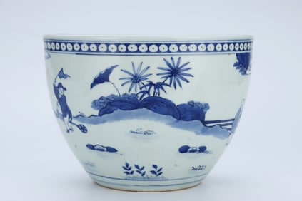 A BLUE AND WHITE 'INFANTS PLAYING' SCROLL JAR