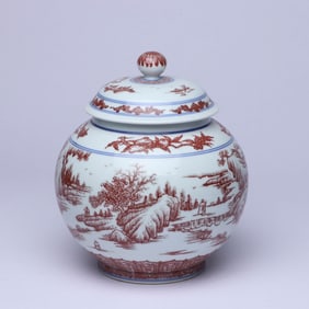 A BLUE AND WHITE AND IRON-RED 'LANDSCAPE AND FIGURES' COVERED JAR
