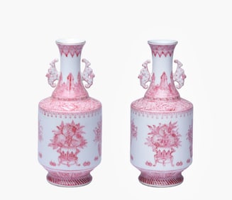 A PAIR OF RUBY RED-GLAZED 'ANTIQUITIES AND FRUIT' DOUBLE-HANDLE VASES