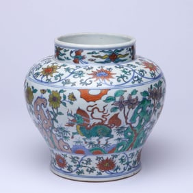 A DOUCAI 'ROCKERY, FLOWERS AND QILIN' JAR