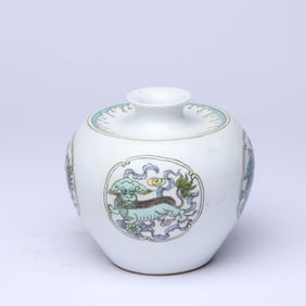 A FAMILLE ROSE MEDALLION 'AUSPICIOUS BEASTS' APPLE SHAPED JAR