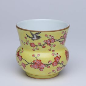 A FAMILLE ROSE 'FLOWERS AND BIRDS' SPITTOON