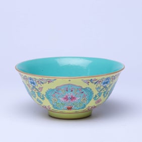 A YELLOW-GROUND FAMILLE ROSE MEDALLION 'FLOWERS' BOWL