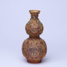 A GILT-BRONZE AND GEM-SET 'SHOU ' GOURD-SHAPED VASE