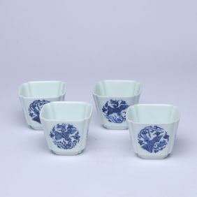 A SETS OF BLUE AND WHITE 'PHOENIX' CUPS