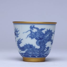 A BLUE AND WHITE 'WAVES AND DRAGON' CUP