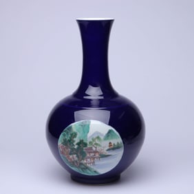 A BLUE-GLAZED FAMILLE ROSE MEDALLION 'LANDSCAPE AND FIGURES' VASE