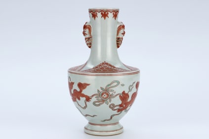 AN IRON-RED 'LION AND BALL' DOUBLE-HANDLE VASE