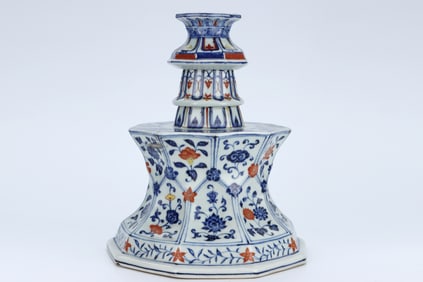A WUCAI 'INTERLOCKING FLOWERS' CANDLESTICK