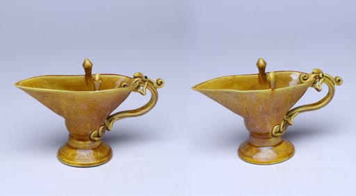 A PAIR OF YELLOW-GLAZED 'FLOWERS AND FRUIT' JUE CUPS