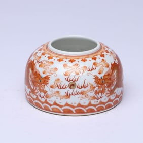 AN IRON-RED 'TWO DRAGONS CHASING A PEARL' WATER POT