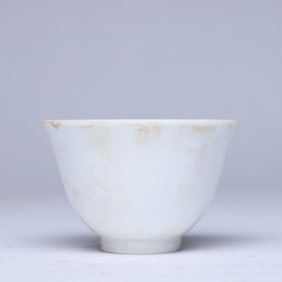 A WHITE-GLAZED 'DRAGON' CUP