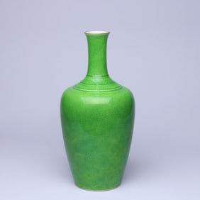 A GREEN-GLAZED RADISH-SHAPED VASE