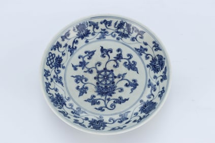 A BLUE AND WHITE 'LOTUS AND EIGHT BUDDHIST EMBLEMS' DISH