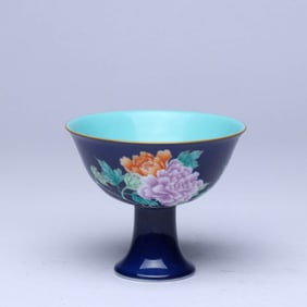 A BLUE-GROUND ENAMEL 'FLOWERS AND BUTTERFLIES' STEM CUP