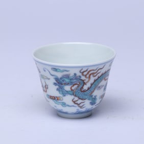 A DOUCAI 'CLOUD AND DRAGON' BELL-SHAPED CUP