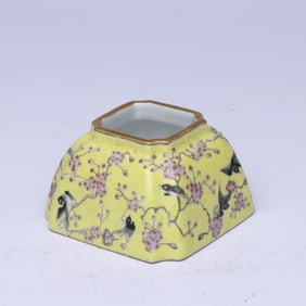 A YELLOW-GROUND FAMILLE ROSE 'MAGPIE ON PLUM BRANCH' WATER POT