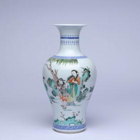 A BLUE AND WHITE AND WUCAI 'FIGURES AND STORY' GUANYIN VASE