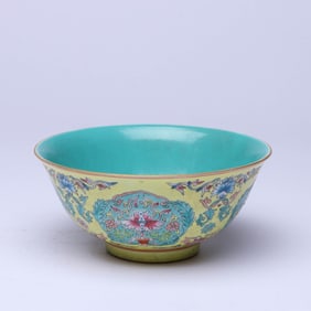 A YELLOW-GROUND FAMILLE ROSE MEDALLION 'FLOWERS' BOWL