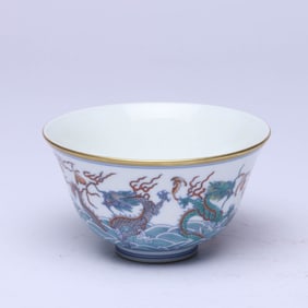 A DOUCAI 'WAVES AND DRAGON' BOWL