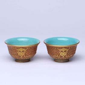 A PAIR OF RED-GLAZED 'FU' CUPS