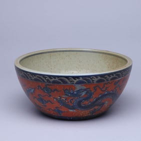 A RED-GROUND BLUE AND WHITE 'CLOUD AND DRAGON' JAR