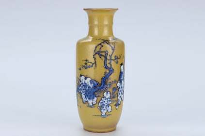 A YELLOW-GROUND BLUE AND WHITE 'FIGURES' ROULEAU VASE