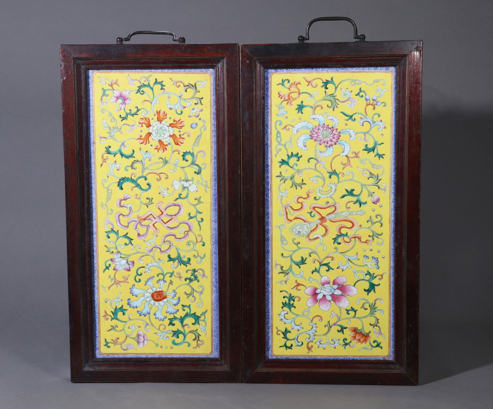 A PAIR OF YELLOW-GROUND YANGCAI 'FLOWERS' PORCELAIN TABLE SCREENS (1 of 6)